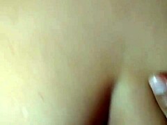 Mature whore enjoys anal play with dildo