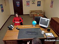 Brunette MILF gets spied on while being pleasured in the office