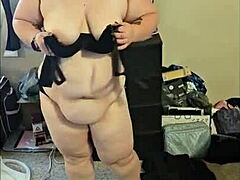 Amateur BBW shows off her moves in a striptease routine